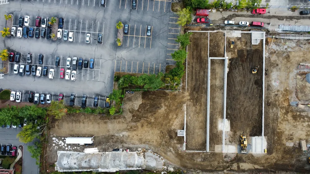 Bulldozing in between the walls to smooth it out